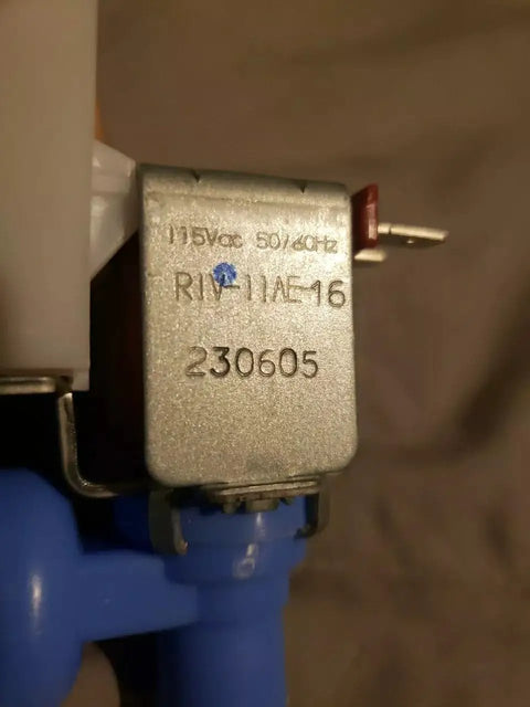 Close-up of RIV-11AE-16 Refrigerator Ice Maker Inlet Water Valve With Guard Replacement Part WR57X10033 for GE refrigerators.