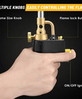Close-up of hand holding High Intensity Propane Torch Head With Trigger Start For MAP Pro Tanks showing knob and flame control button.