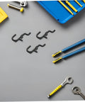 Ultimate Pegboard Hooks Set For Garage Wall Organization, Movable Layout To Fit Hand Tools And Small Gear, Universal Tool Hangers For Home And Shop, Flexible Pegboard Rack System For Kitchen Studio And Retail Displays black plastic hooks with tools on gray board