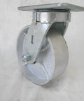 Heavy Duty Swivel Casters Kingpinless Semi Steel Wheels Six Inch By Two Inch 1200 Pound Capacity Per Wheel shown with metal plate and roller.