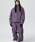 Person wearing Mens Baggy Snow Suit With Insulated Ski Jacket And Pants Set Waterproof Windproof Breathable Snowboarding Gear Loose Fit