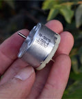 Mini 32mm Round Spindle Motor, DC 6V 9V 12V, 5600 RPM, Carbon Brush Motor held in hand showing front view