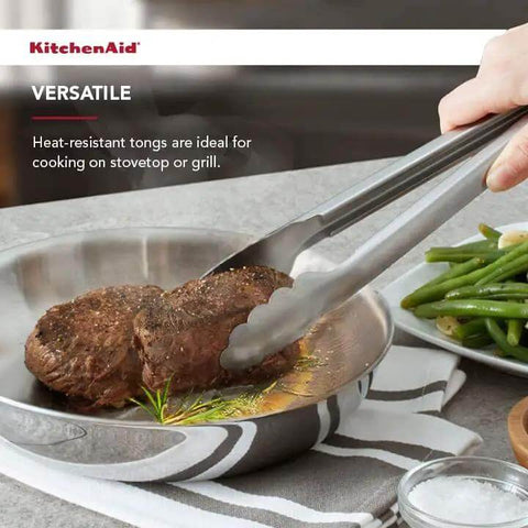 Stainless Steel Utility Tongs 12 Inch With Locking Mechanism in use flipping steak in frying pan