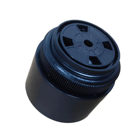 Slick Drop In Replacement Steady Tone Alarm High Power Beacon For Genie Vertical Mast And Scissor Lifts Hard Hat Ready Warning Signal Compatible With GR And QS Models DC 6 To 30V black alarm part, top view, cylindrical design.