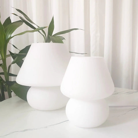 Swirl Mushroom Glass Lamp In Striped Pink, Hand Blown Translucent Murano Style Table Bedside Light on white table.
