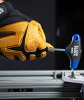 Using Eight-Piece T-Handle Hex Key Set With Six Inch Blades, Metric Allen Wrenches, Stand Included on metal framework