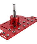 Top Tier 2 In 1 Shelf Pin And Cabinet Hinge Jig Kit Crafted From Solid Aluminum With Four Hardened Steel Drill Bits For No Sweat Hole Placement On Any Weekend Carpentry Or House Upgrade Project, featuring a red aluminum jig with multiple drill holes.