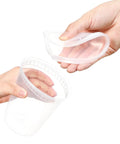 Hands holding a clear container and lid from the Twenty Pack 32 Oz Deli Containers With Lids Airtight Food Storage For Takeout And Meal Prep Freezer Safe Dishwasher Safe Microwave Safe BPA Free Plastic Containers For Leftovers And Lunches