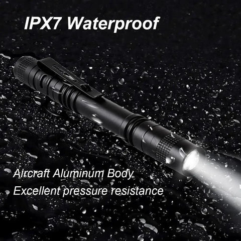 Five Pack Pen Light Flashlights With Clip Ultra Bright Q5 LED Mini Pocket Flashlights showing waterproof feature with water droplets