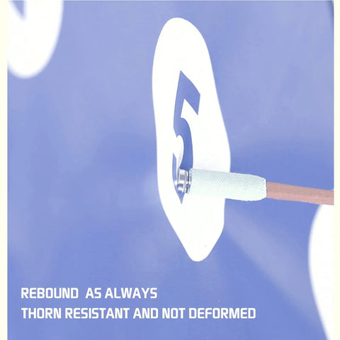 Close-up of a sword hitting the bullseye on a fencing training target with five bullseyes, highlighting durability and resistance.