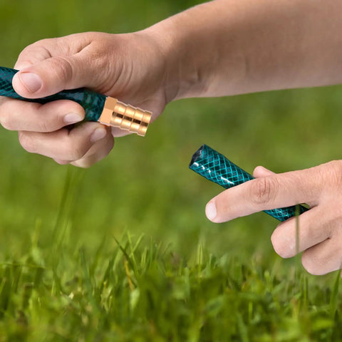 Hands installing Six Pack Garden Hose Repair Connectors With Stainless Steel Clamps For Five Eighth Inch Hoses, Durable Brass Fittings Kit For Quick Repairs And Leak Free Watering