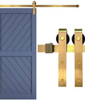 Gold Sliding Barn Door Hardware Kit With 72 Inch Track, Brushed Brass Finish, Aluminum Rail, shown with blue door