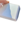 Glossy Pearl White Dashboard Cover For Tesla Model 3 And Y Direct Fit ABS trim held in hand, showcasing the sleek design and finish.