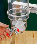 Top Tier 18 Liter Dry Food Dispenser With Six Three Liter Sealed Jars Featuring No Sweat One Ounce Dial Port showing control knob and jar.