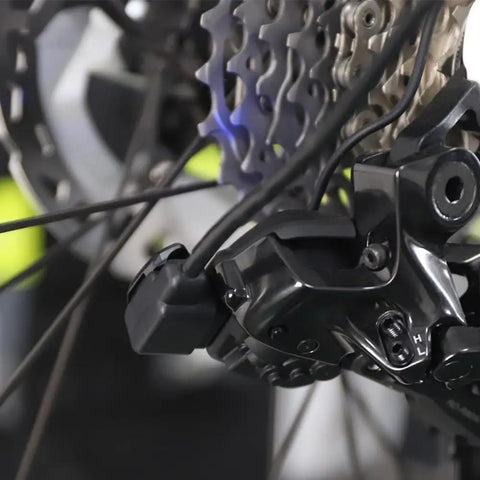 Close-up of Di2 12-Speed Electronic Shifting Derailleur Charging Cable With USB And Type-C 150cm on a bicycle gear