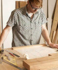 Woodworker using Dual Style Pro Grade Cutting Board Template Set In Clear Acrylic Charcuterie Board Templates for Router.