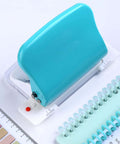 Blue 10 Hole Puncher for loose leaf paper, handheld metal circle punch tool for A4 A5 B5 notebooks, works with 20 26 30-hole bindings.