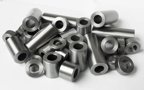 Heavy Duty Round Steel Spacers Three Quarter Inch Outer Diameter Half Inch Inner Bore Eight Eighths Inch Long in a pile.