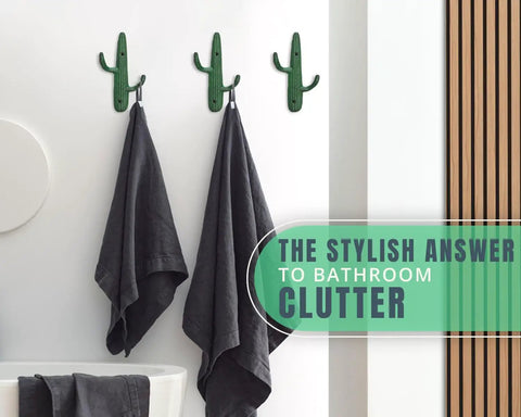 Roll With That Chill Southwest Vibe Using This Set Of Three Rustic Green Cast Iron Cactus Wall Hooks holding towels in bathroom.