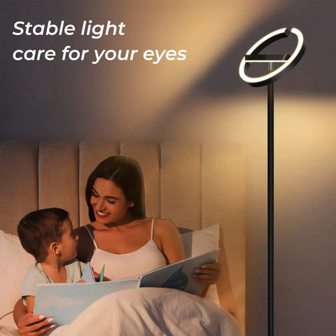 Chill At Home With A Sleek Saturn Ring LED Floor Lamp, 36W, 1800LM Bright, Fully Rotatable Standing Light illuminating a cozy reading nook.