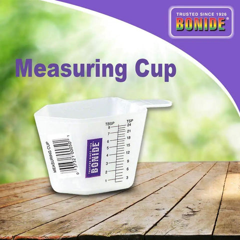 4 Oz Multipurpose Garden Measuring Cups For Pesticide And Fertilizer Mixing At Home Or In The Yard Includes Teaspoon, Tablespoon And Ounce Measurements Spill Free Tool For Precise Garden Care And Safe Spraying. white plastic measuring cup with tsp, tbsp, and oz marks