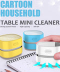 Cordless Desk Vac For Quick Cleanup, Tiny Table Dust Sweeper With 360 Degree Rotating Nozzle, Energy Saver, white model in hand over notebook