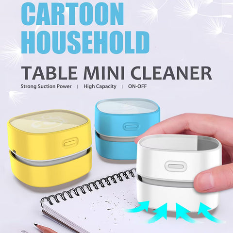 Cordless Desk Vac For Quick Cleanup, Tiny Table Dust Sweeper With 360 Degree Rotating Nozzle, Energy Saver, white model in hand over notebook