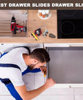 Man installing undermount drawer slides replacement kit with rollers, tools and guides on a kitchen counter.
