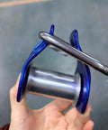 Close-up of Heavy Duty Zip Line Trolley Cable With Quick Setup Slider And Smooth Bearing Wheel, blue and metallic design