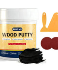 Deep Black Wood Filler And Putty 9.87oz container with scrapers and sandpaper for repairing ebony cabinets and dark wood surfaces.