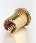 Close-up of a zinc-plated knurled rivet from 220 Pcs Metric Rivet Nut Kit Zinc Plated Carbon Steel Flat Head Rivnut Assortment.