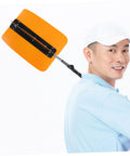 Man using Golf Swing Power Fan Trainer With Adjustable Wind Resistance For Indoor Outdoor Practice Portable Quiet Motor.