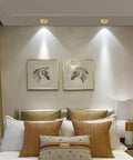 Top Tier Brass LED Recessed Downlight 4.5 Inch Adjustable Directional Ceiling Spotlight With CRI 90 illuminating artwork above bed.