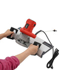 Heavy Duty Electric Tile Bevel Cutter With A Razor Sharp 1200W Saw Blade Spinning At 13000 RPM, held with two hands.