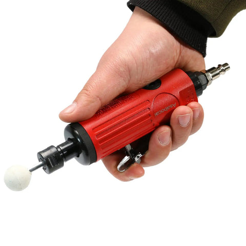 Shop Grade 1/4 Inch Pneumatic Straight Die Grinder in hand, compact tool with white polishing head for precise grinding.