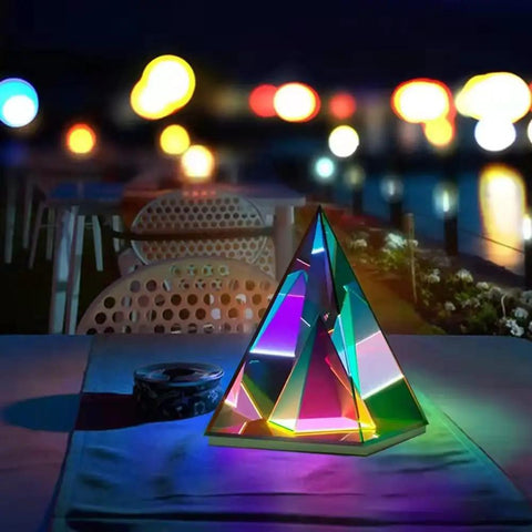 Pyramid Modern Table Lamp Led Desk Light With Colorful Transparent Glow 3D Acrylic Home Decor on outdoor table at night