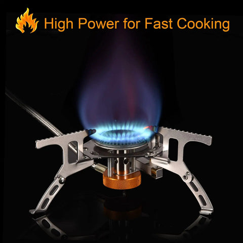 Portable Camping Gas Stove With 1Lb Propane Tank Adapter lit with blue flame, showing foldable design and piezo ignition for outdoor use.