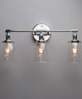 Three Light Industrial Wall Sconce With On Off Switch And Clear Glass Shade For A Cool Retro Vibe Vintage Antique Brass Vanity Lighting