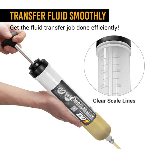 500cc Fluid Extractor Syringe With Hose Manual Oil Suction Pump for Transmission Differential, showing clear scale lines in use.