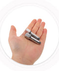 Two Piece Grease Tool Kit With Steel Tip Nozzles for Precision Greasing in hand, showcasing size and design.