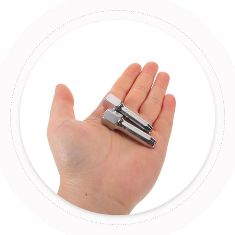 Hand holding Two Pack Steel Grease Coupler Adapters For Grease Guns With Quick Fit Heavy Duty Automotive And Industrial Use Easy Maintenance