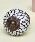 100 Piece White Ceramic Floral Drawer Knobs For Kitchen Cabinet Hardware And Dresser Pulls Offering Top Shelf Durability And Zero Sweat Setup To Finally Polish Your Space, close-up view of white ceramic knob with antique bronze base.
