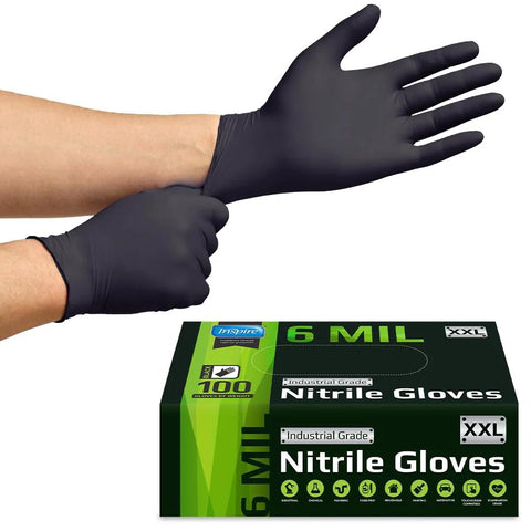 Front view of a person putting on black 6 mil nitrile disposable gloves; XXL Inspire Nitrile Gloves box visible.