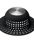 Top Tier Shower Drain Hair Catcher And Bathtub Dome Guard, black silicone with stainless steel top, 4.49 inches, effective clog prevention.