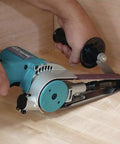 Person using 1-1/8 Inch By 21 Inch Belt Sander With Narrow Belt And Exposed Front Pulley For Tight Spaces on wooden surface