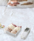 Three Piece Foldable Closet Organizer Bins With Adjustable Drawer Dividers For Socks Undies And Lingerie showing organized bras.