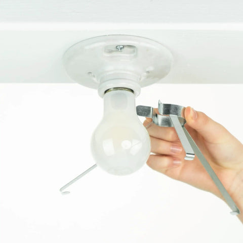 Hand attaching Ceiling Light Cover That Hides Exposed Bulbs In Seconds Clip-On Fit For Most Bulbs And Fixtures Sleek Modern