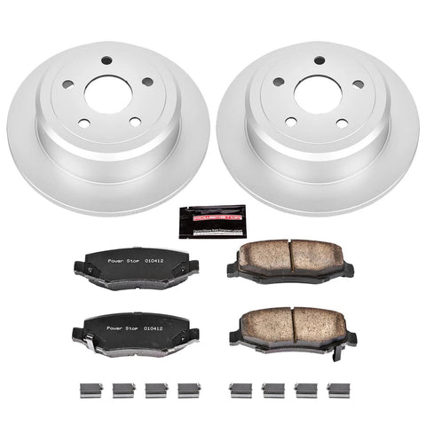 Front view of PowerStop rear brake kit for Jeep Wrangler JK: two coated rotors, ceramic pads, lubricant, and hardware.