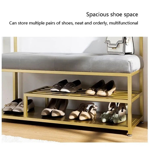 Heavy Duty Coat Rack And Shoe Storage Bench For Entryway Featuring Industrial Metal Frame Upholstered Seat with spacious shoe space and multiple pairs of shoes neatly organized.