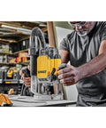 Robust 15 Amp Corded Plunge Router Equipped With Built In Led And Spindle Lock Delivers Badass Routing Power, shown in use.